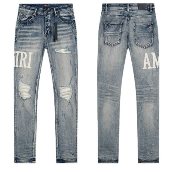 Light Blue Washed Denim Jeans with White AMIRI Logo and Distressing